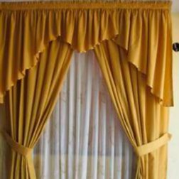 Cortina clsica con arandelas decorativas en tela lisa