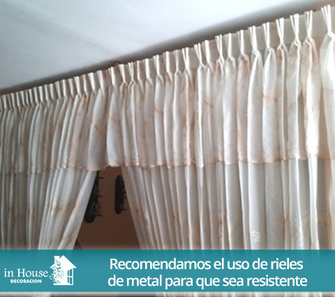 Cortinas clsicas que dividen los espacios en una sala
